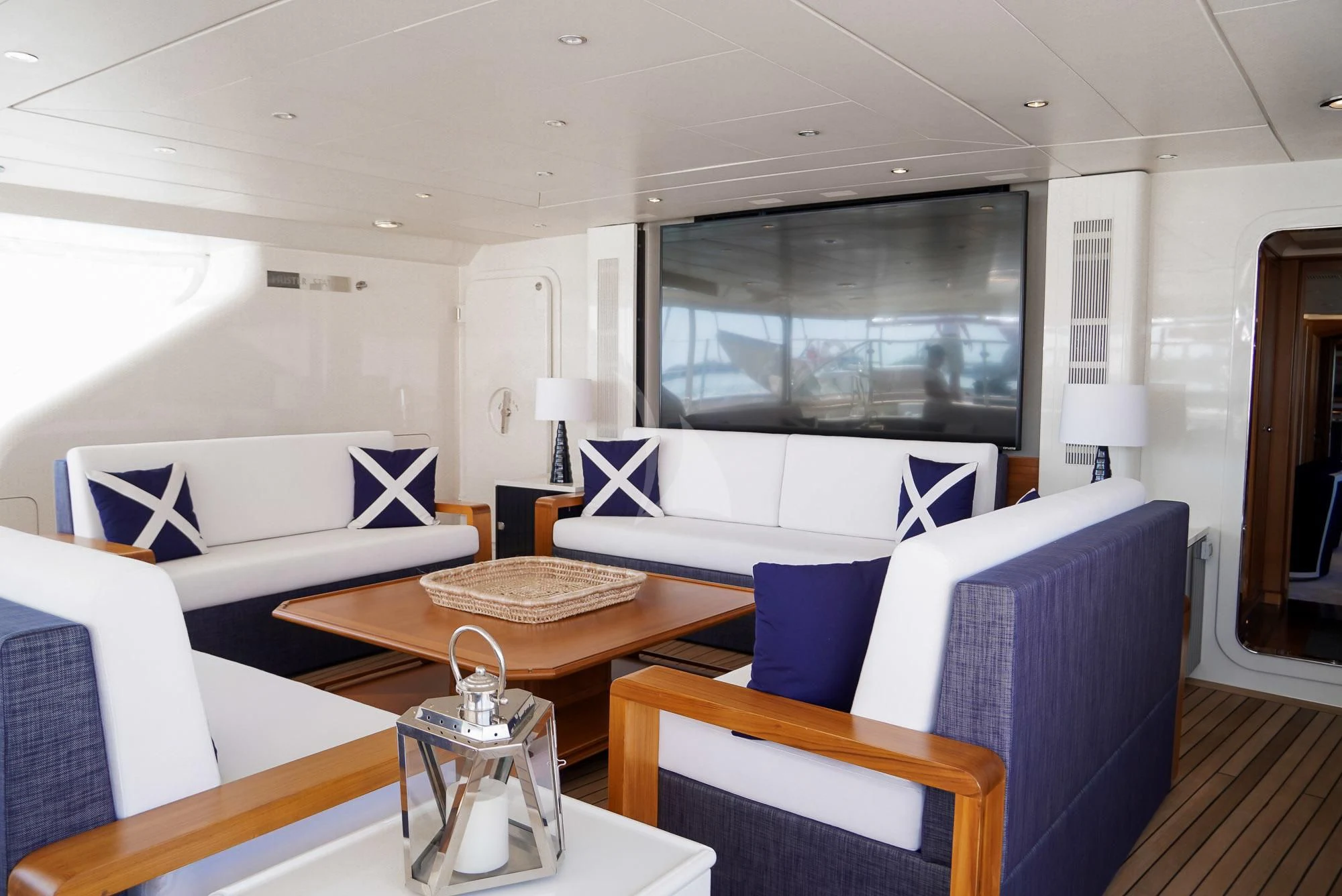 a room with a table and chairs aboard ZENJI Yacht for Sale