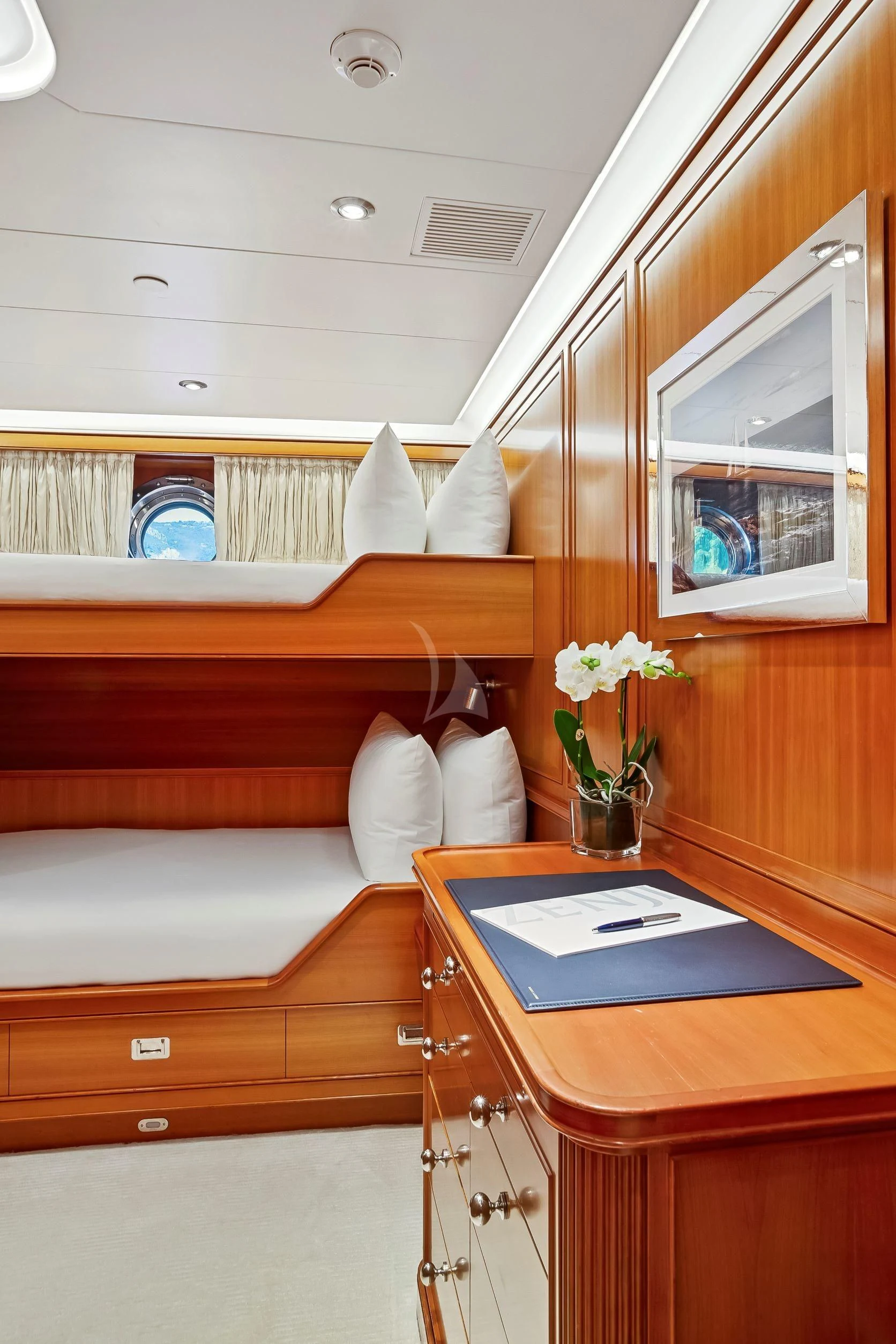 a room with a couch and a table aboard ZENJI Yacht for Sale