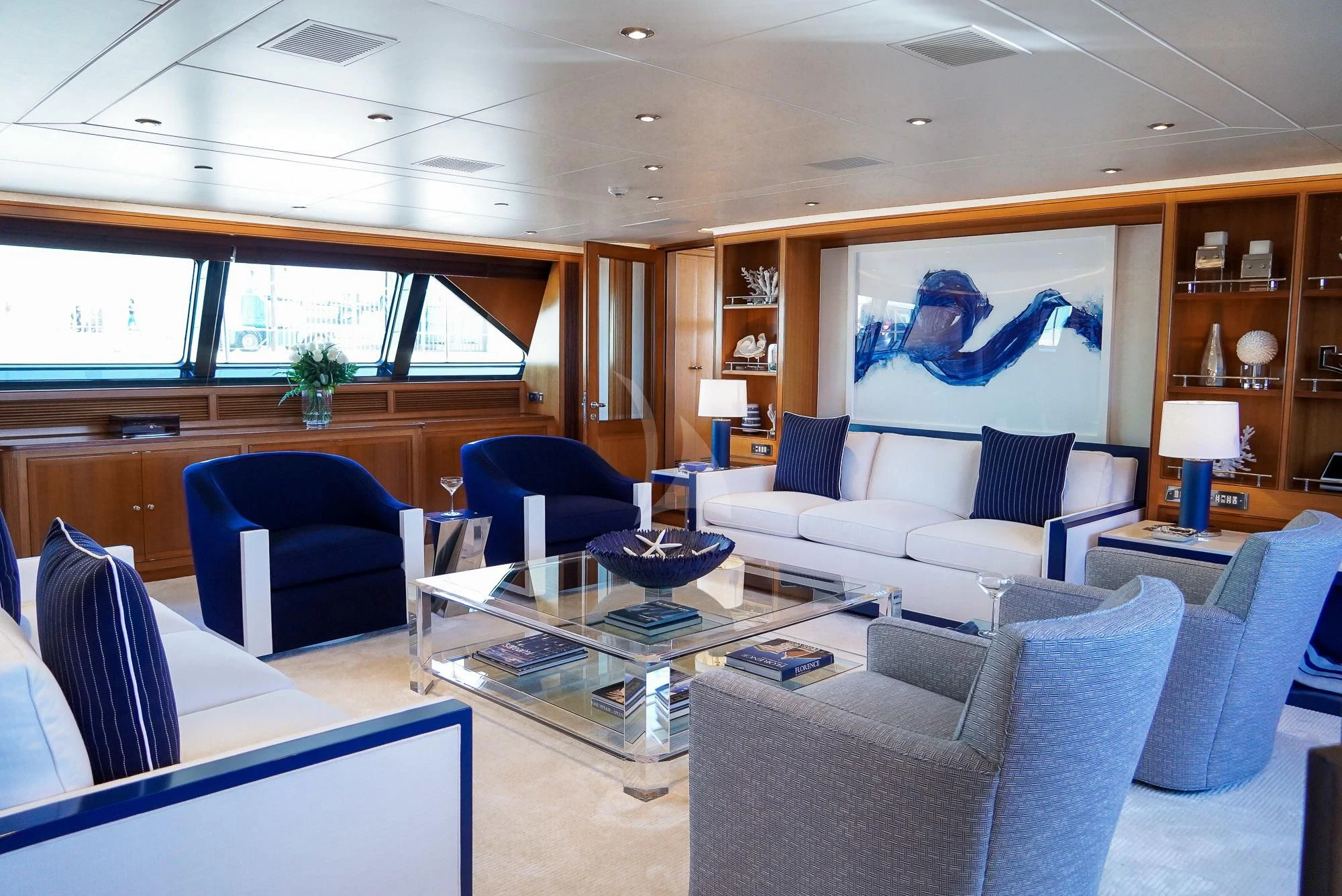 a living room with a large window aboard ZENJI Yacht for Sale
