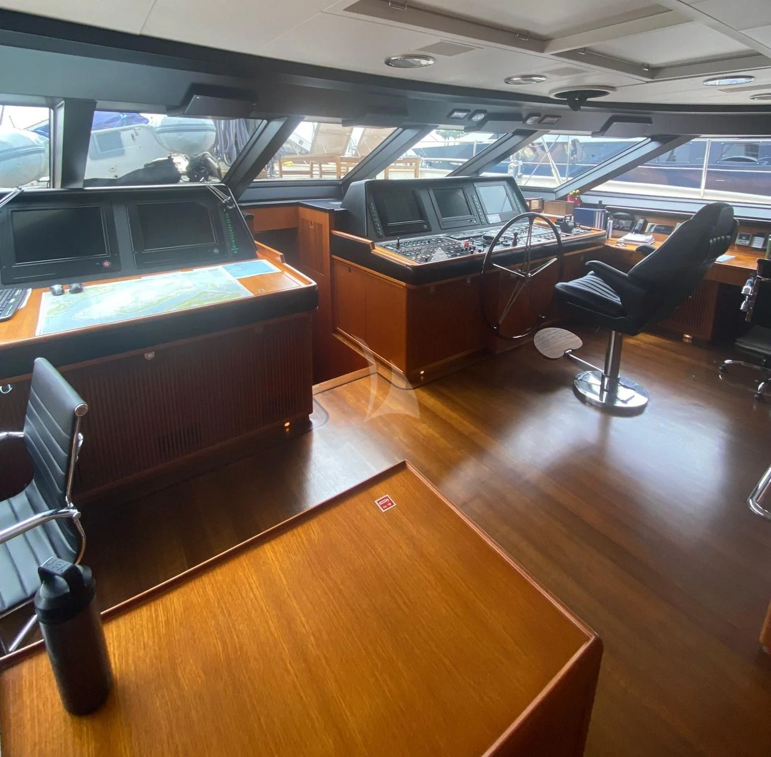 a room with a couch and a piano aboard ZENJI Yacht for Sale