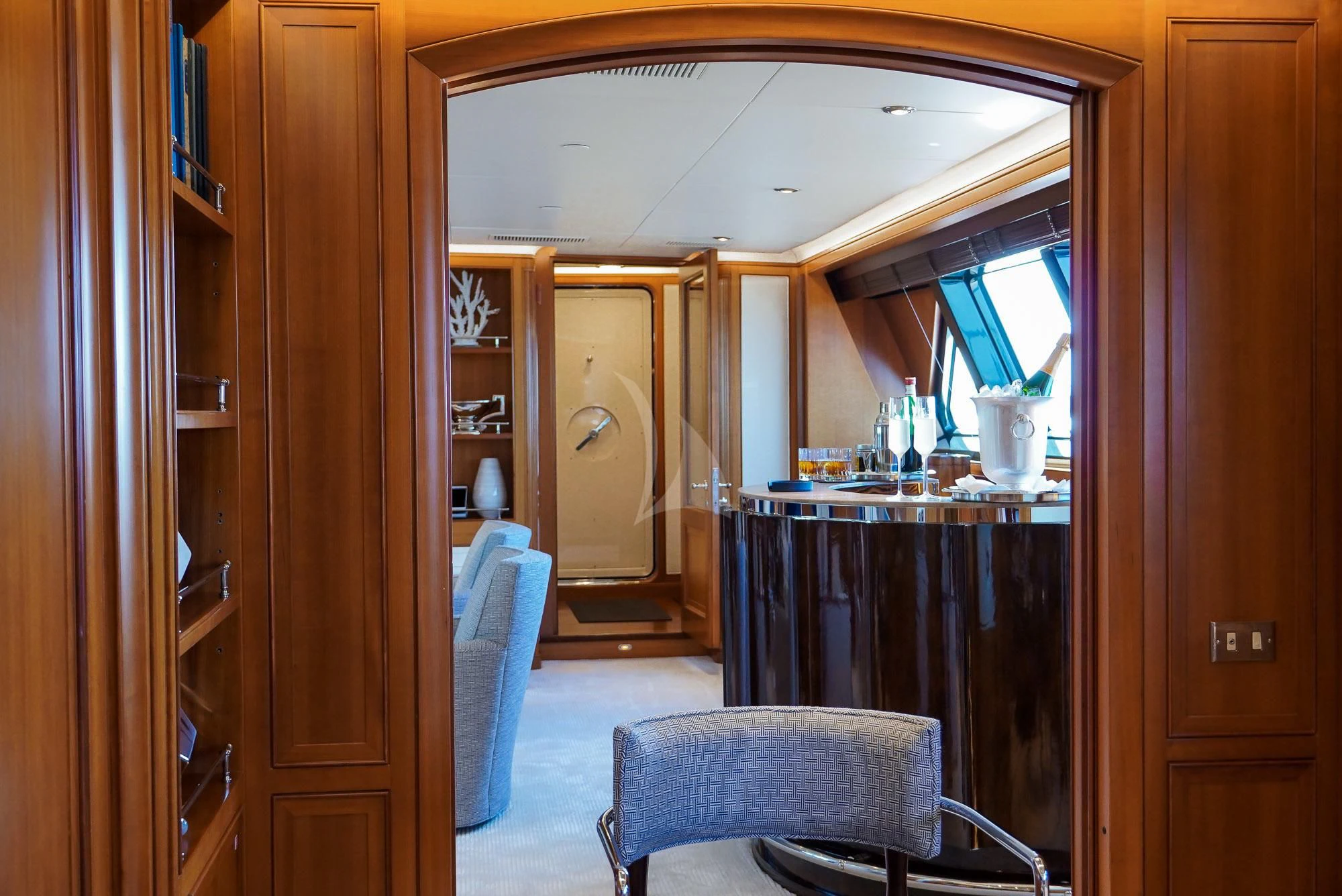 a room with a table and chairs aboard ZENJI Yacht for Sale