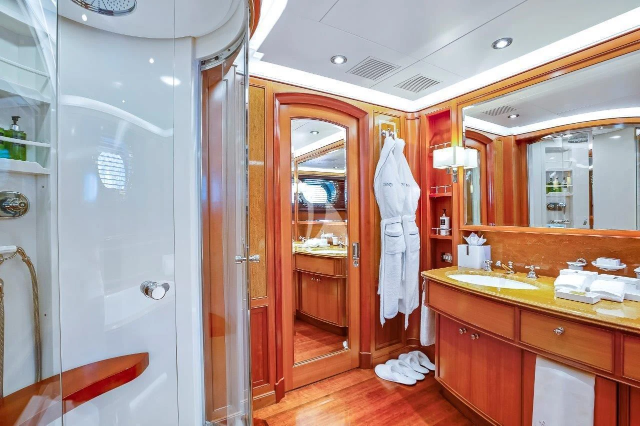 a bathroom with a closet and a sink aboard ZENJI Yacht for Sale