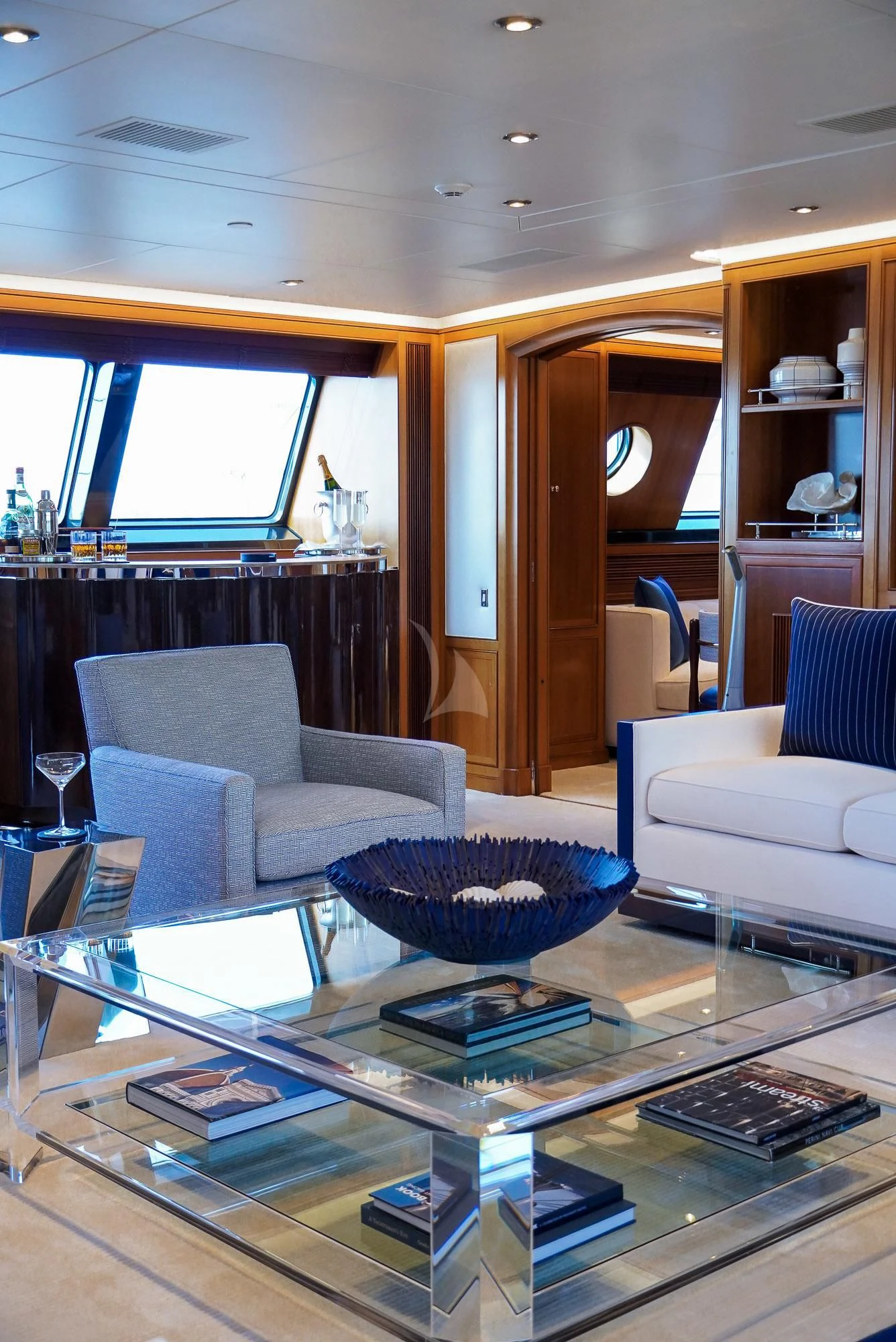 a living room with a table and chairs aboard ZENJI Yacht for Sale
