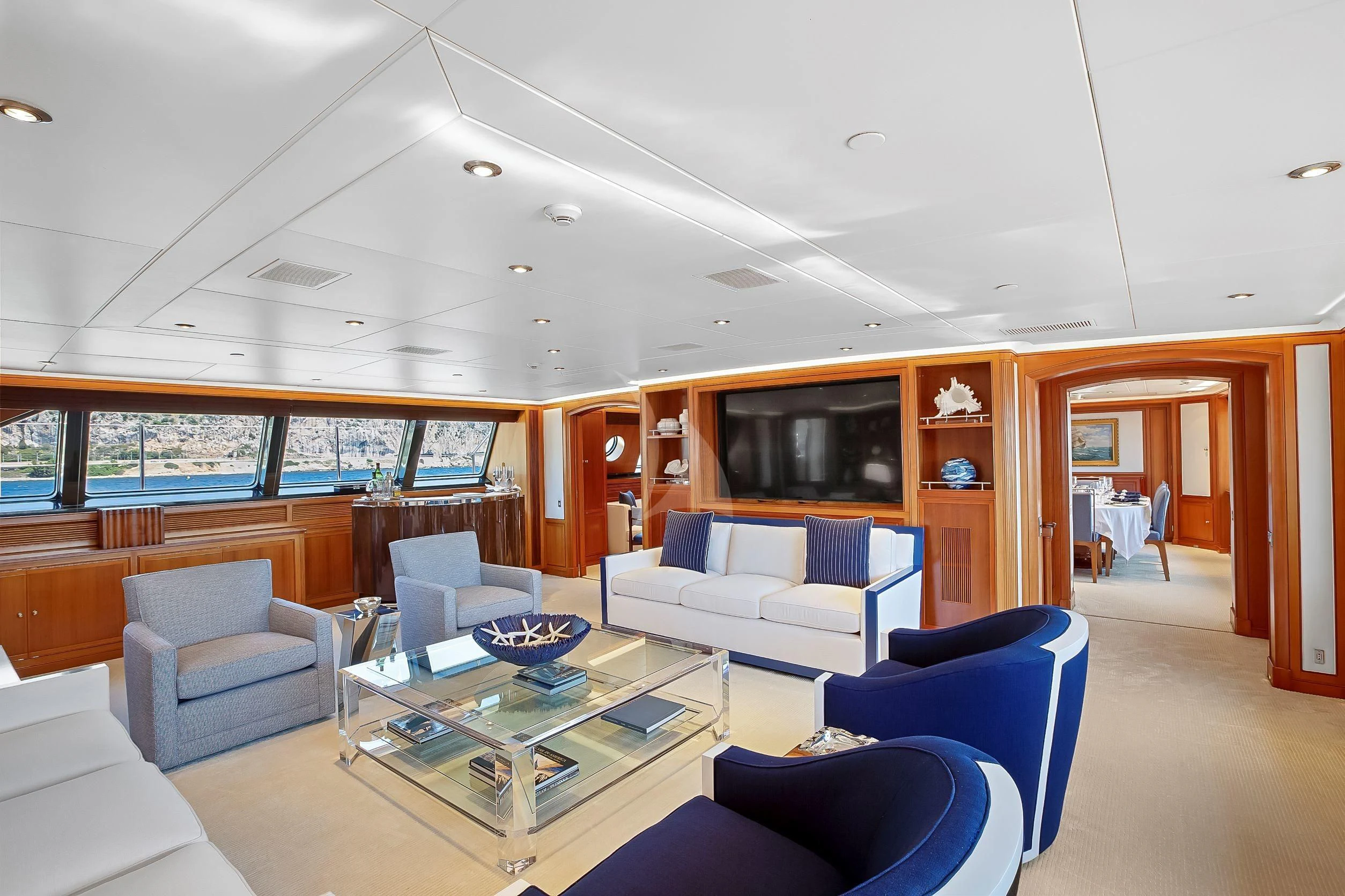 a living room with a large window aboard ZENJI Yacht for Sale