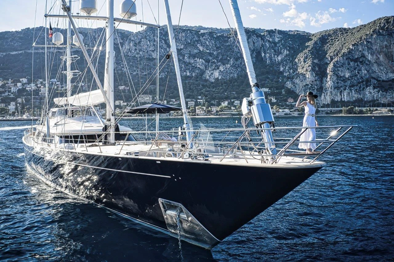 two people standing on a boat aboard ZENJI Yacht for Sale