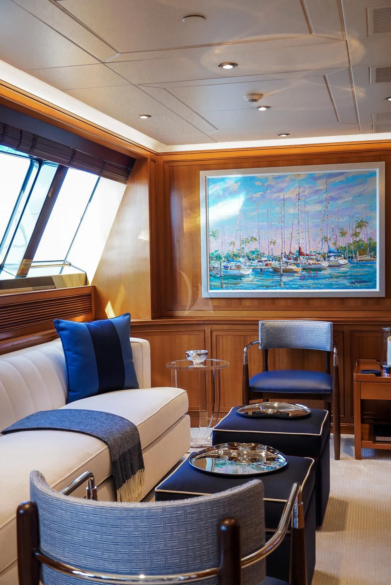 a room with a couch and a table and chairs aboard ZENJI Yacht for Sale