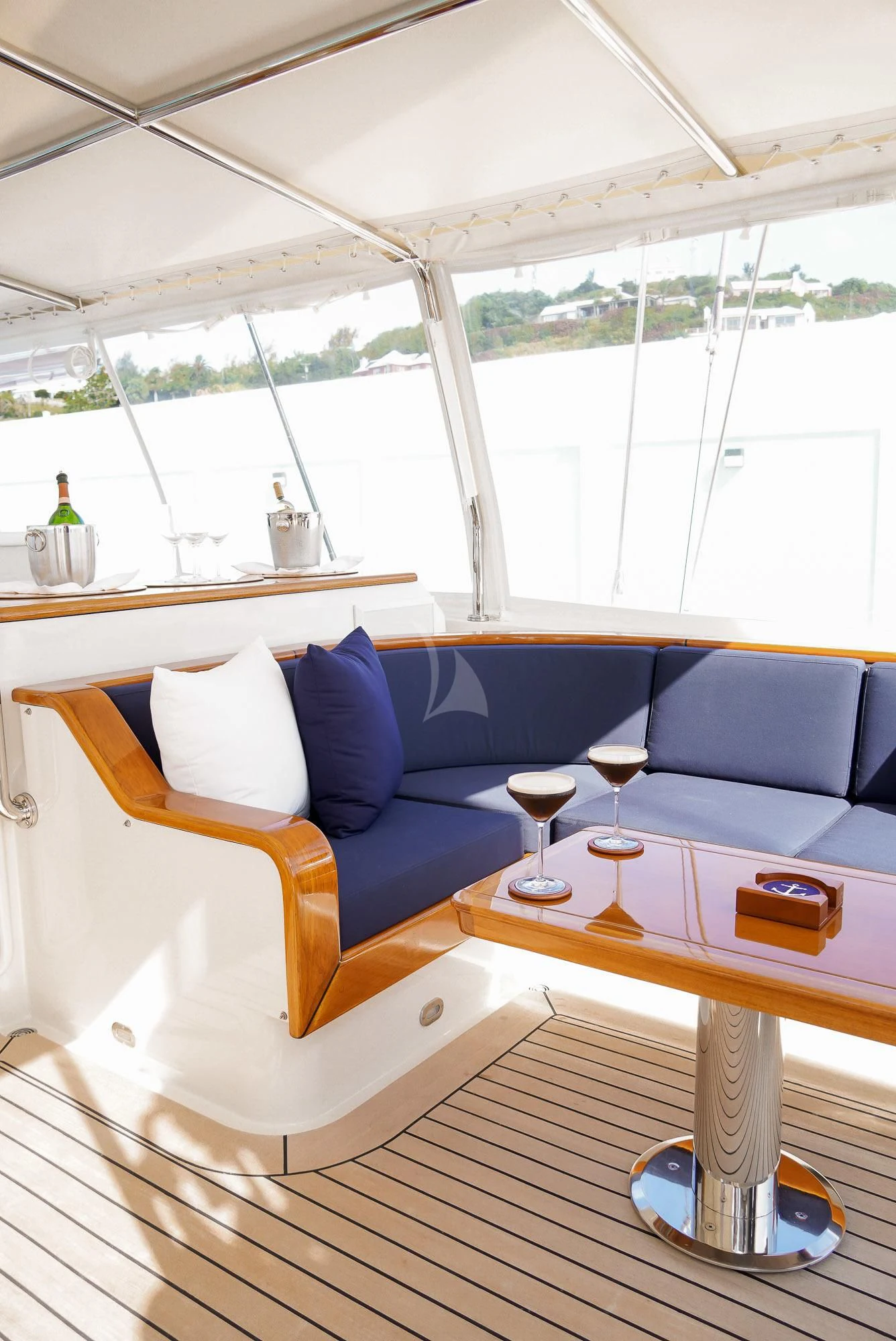 a room with a couch and a table aboard ZENJI Yacht for Sale