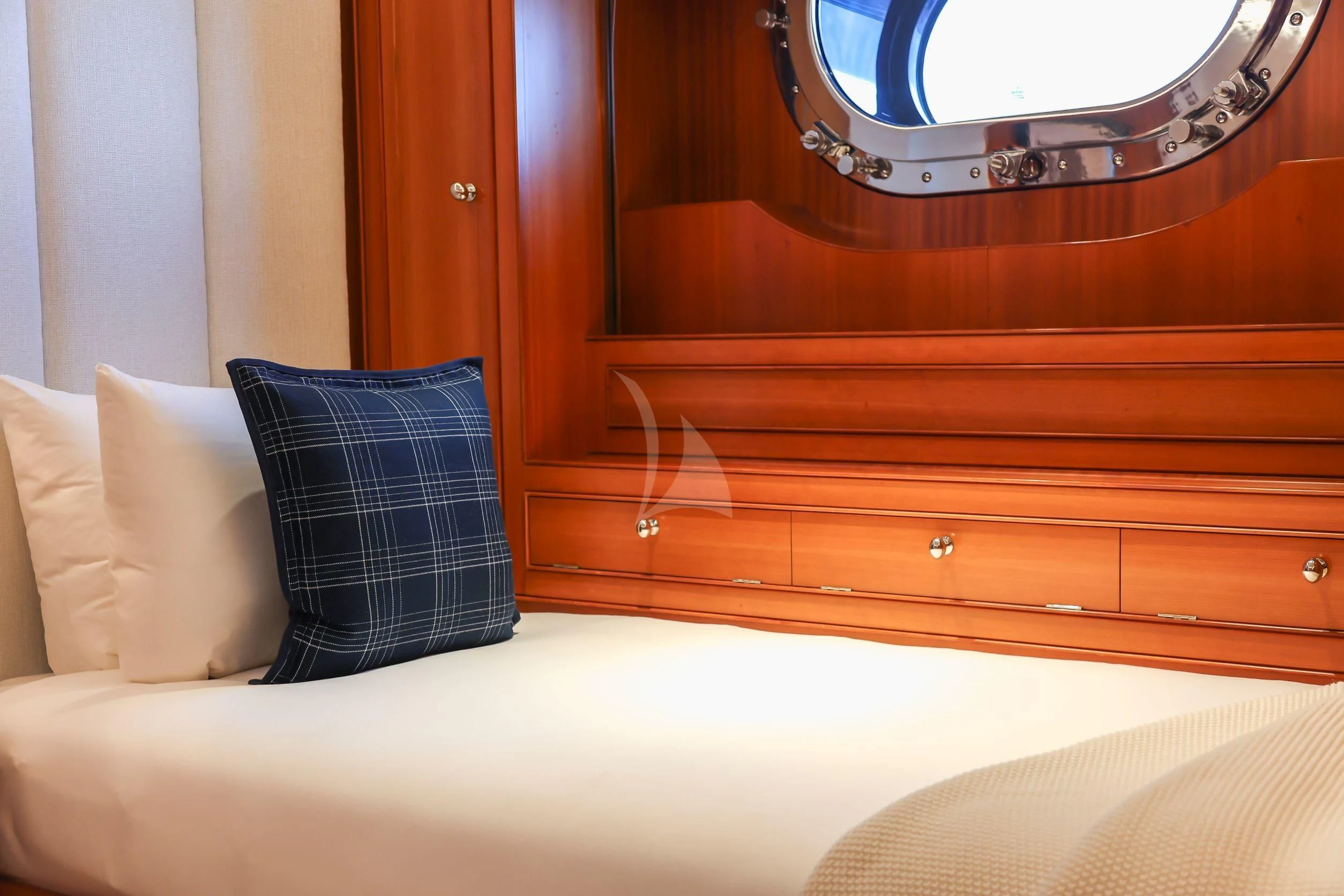 a bed with a mirror on it aboard ZENJI Yacht for Sale
