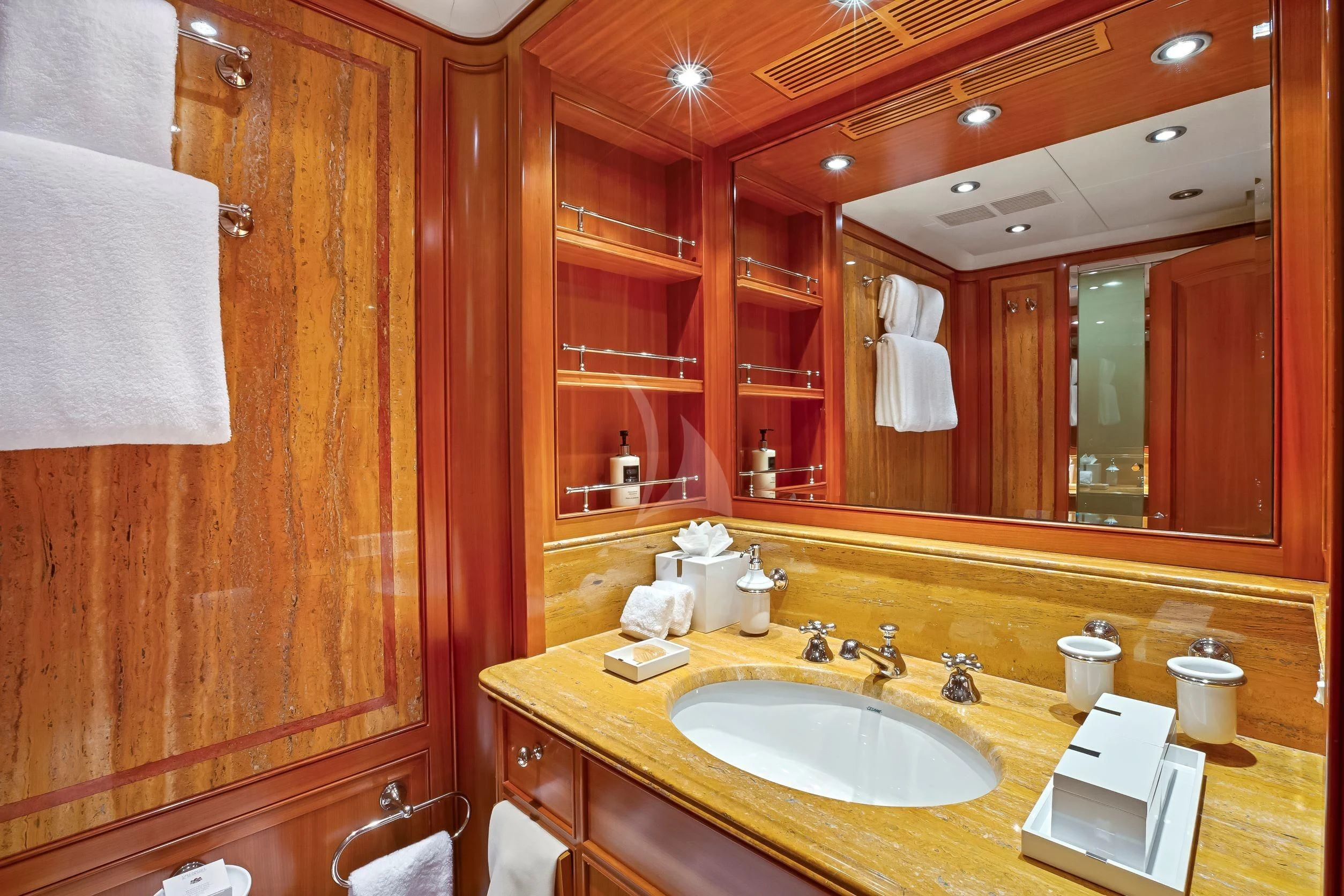 a bathroom with a mirror and a sink aboard ZENJI Yacht for Sale