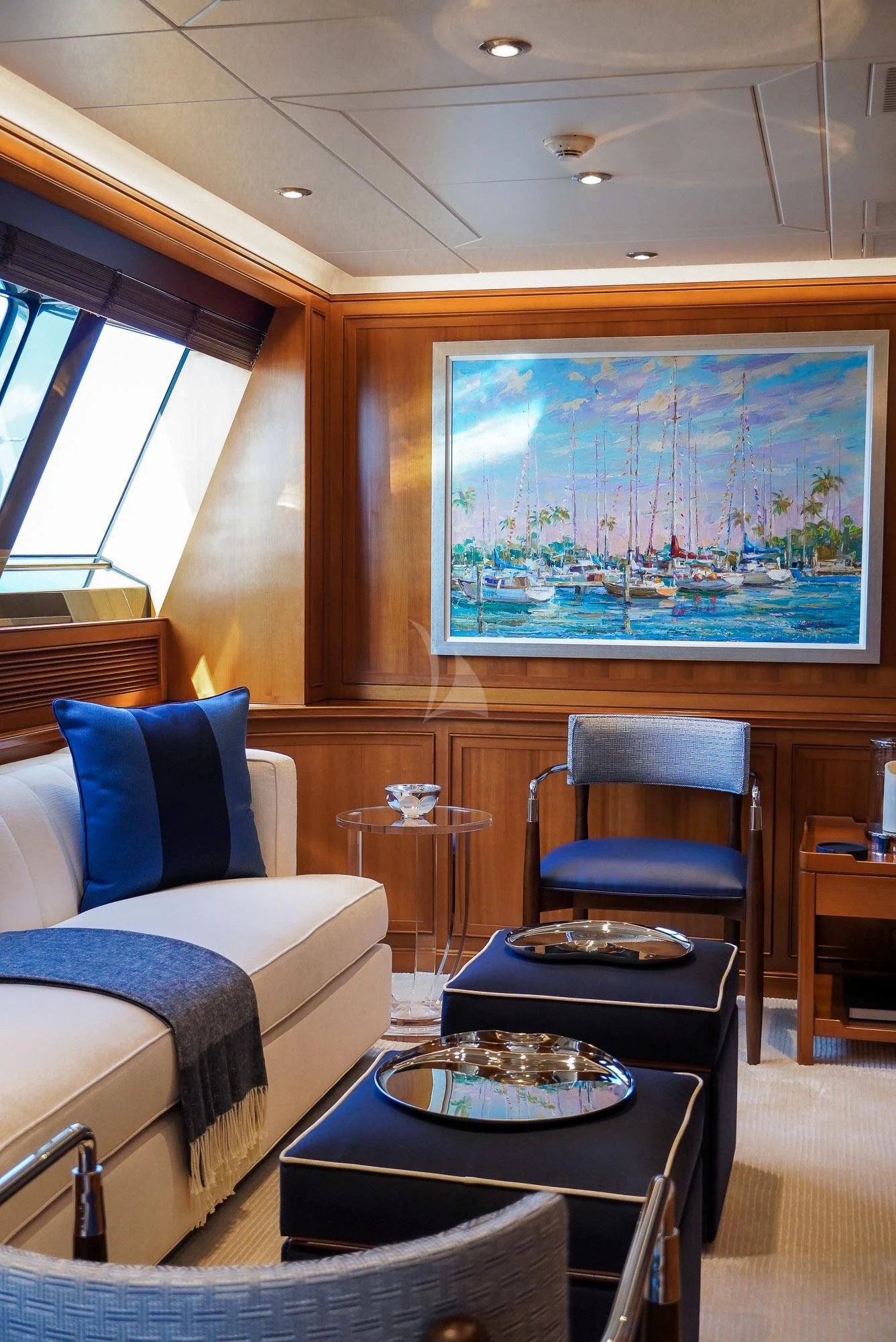 a room with a table and a couch aboard ZENJI Yacht for Sale
