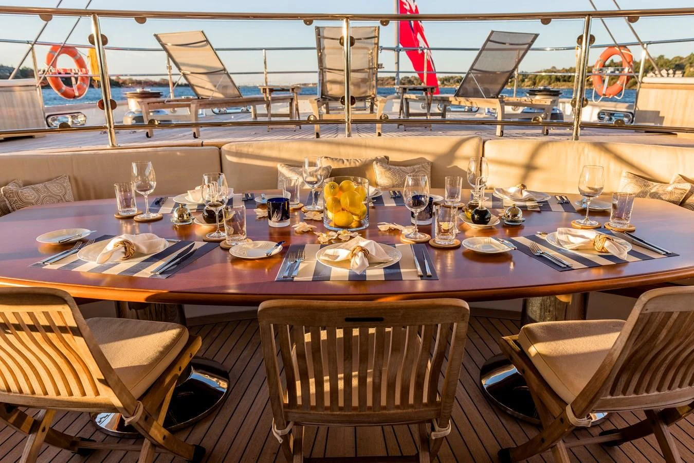 a table set for a dinner party aboard ZENJI Yacht for Sale