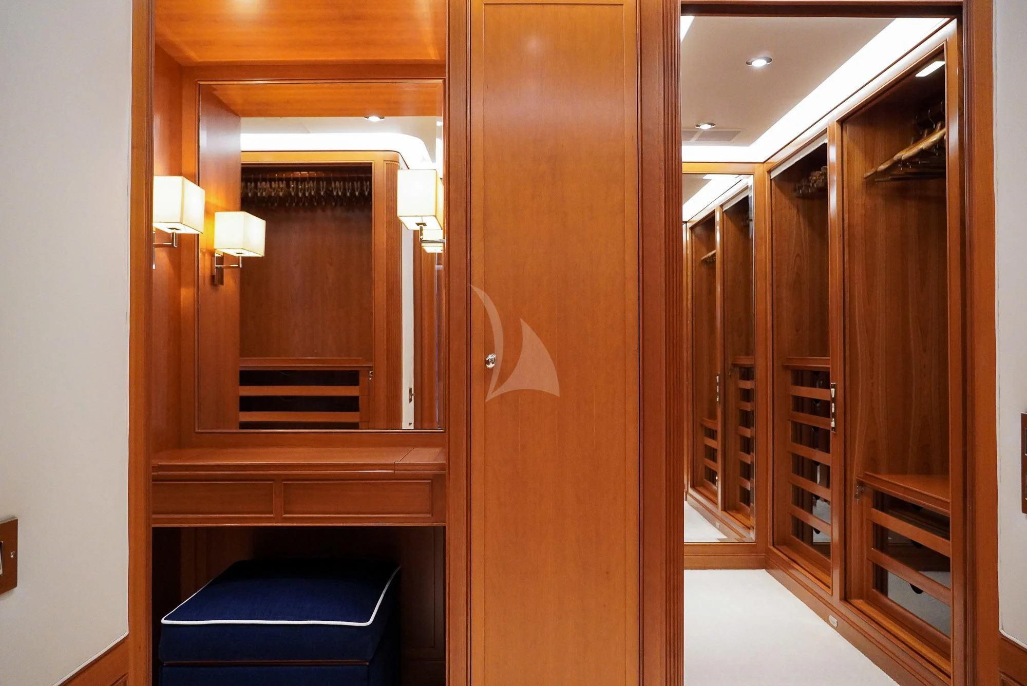 a room with a wood door and a mirror aboard ZENJI Yacht for Sale