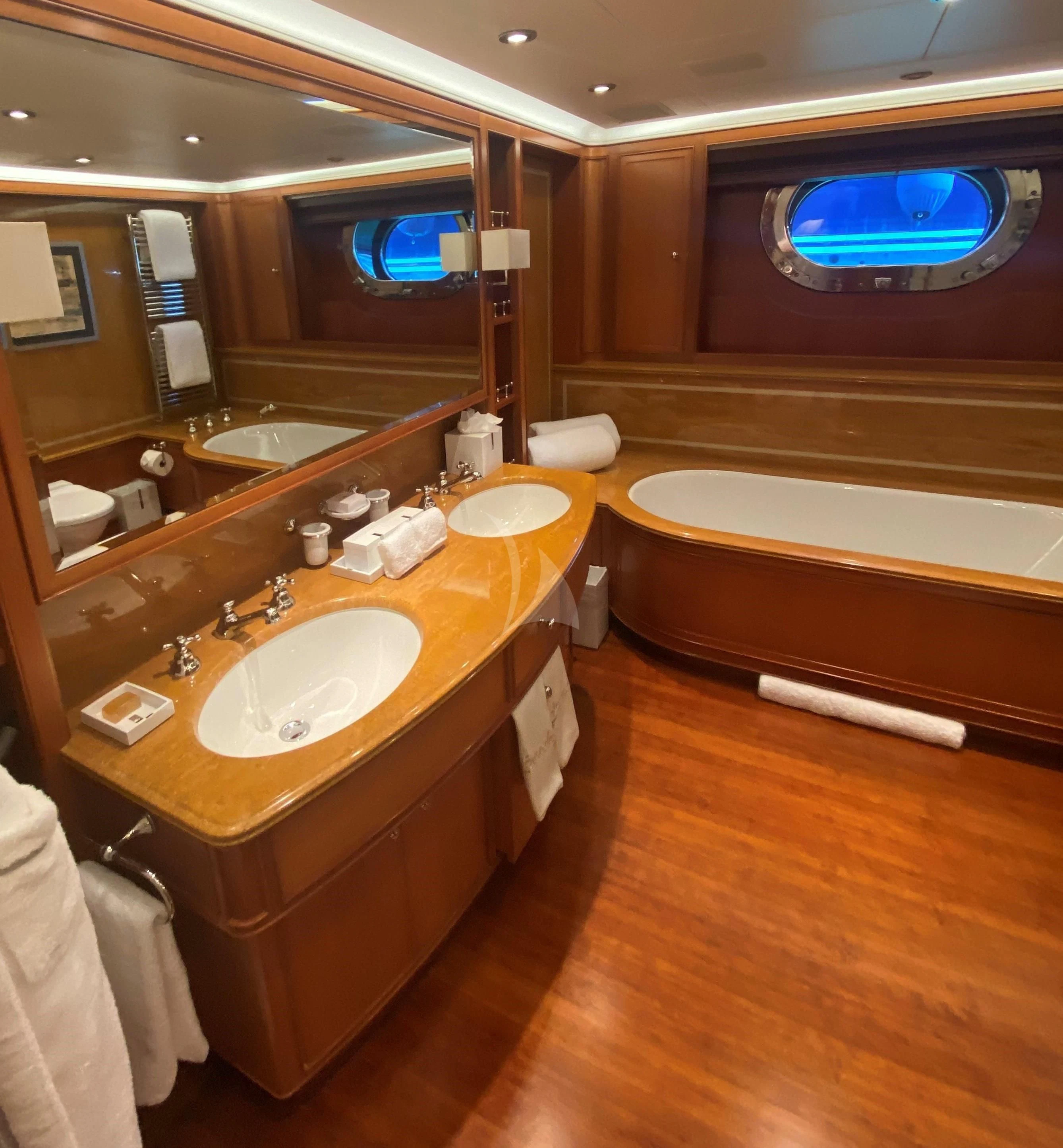 a bathroom with a large mirror aboard ZENJI Yacht for Sale