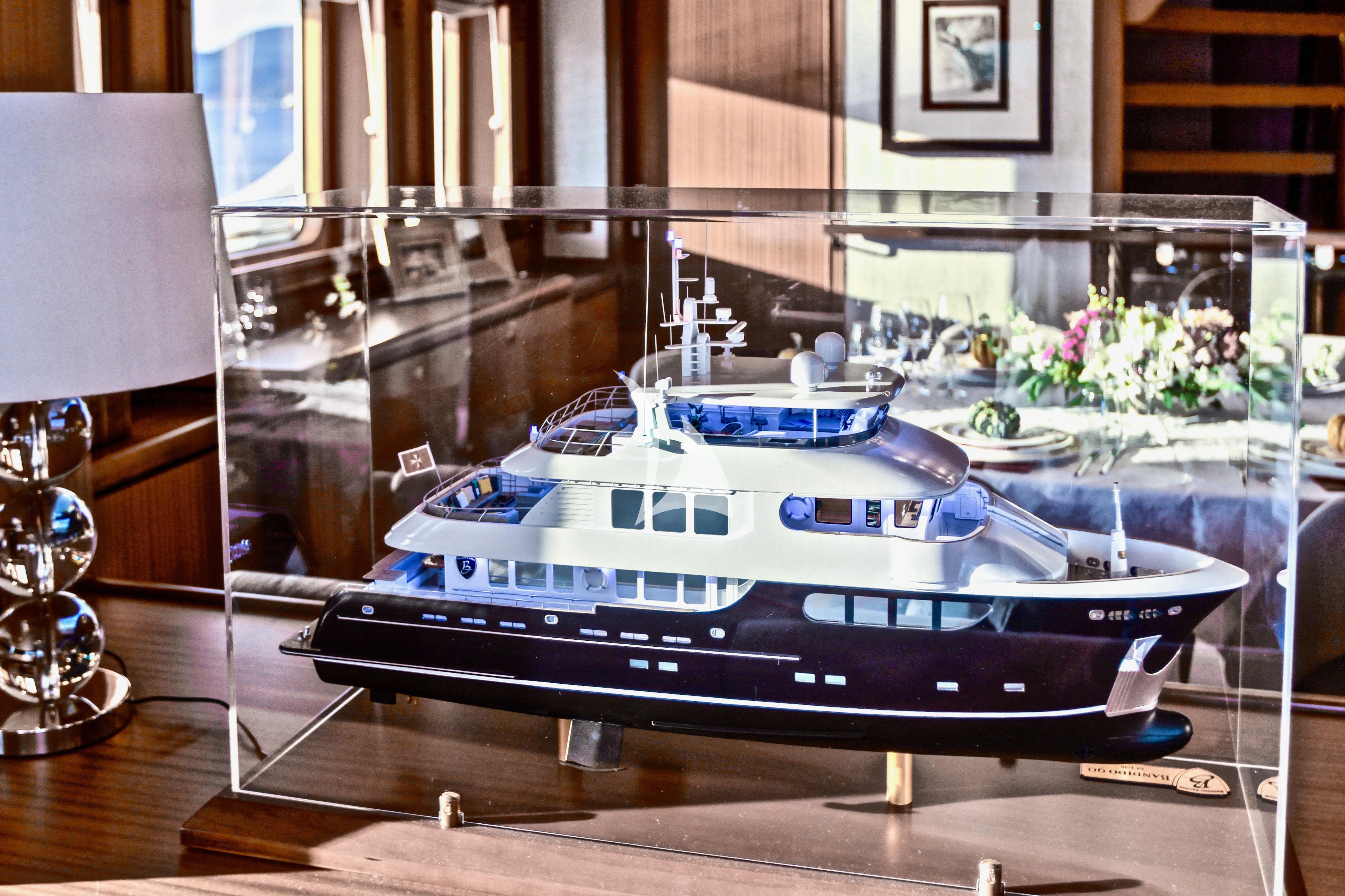 a large boat in a room aboard BALTIC SEA Yacht for Sale