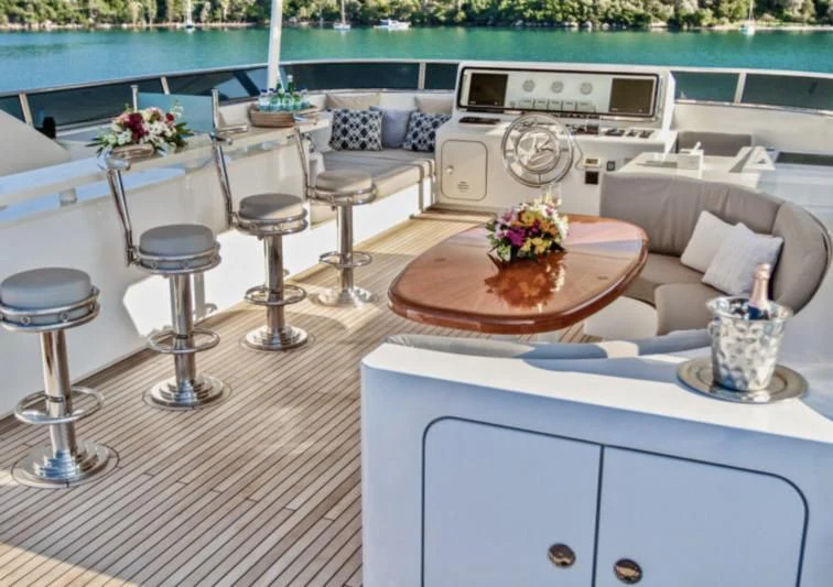 a kitchen with a table and chairs aboard BALTIC SEA Yacht for Sale