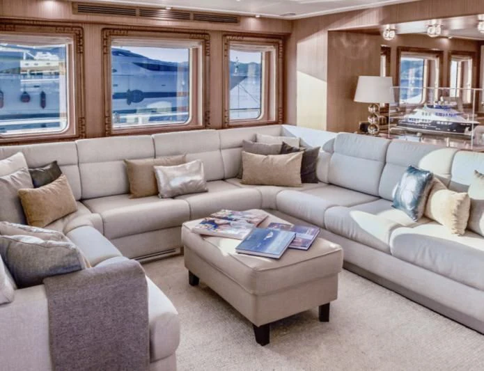 a living room with a couch and a coffee table aboard BALTIC SEA Yacht for Sale