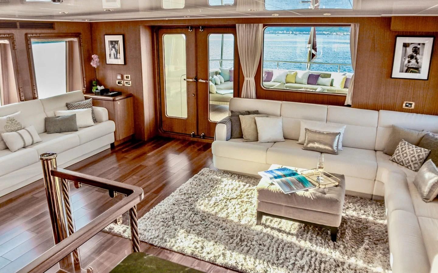 a living room with a couch and a table aboard BALTIC SEA Yacht for Sale
