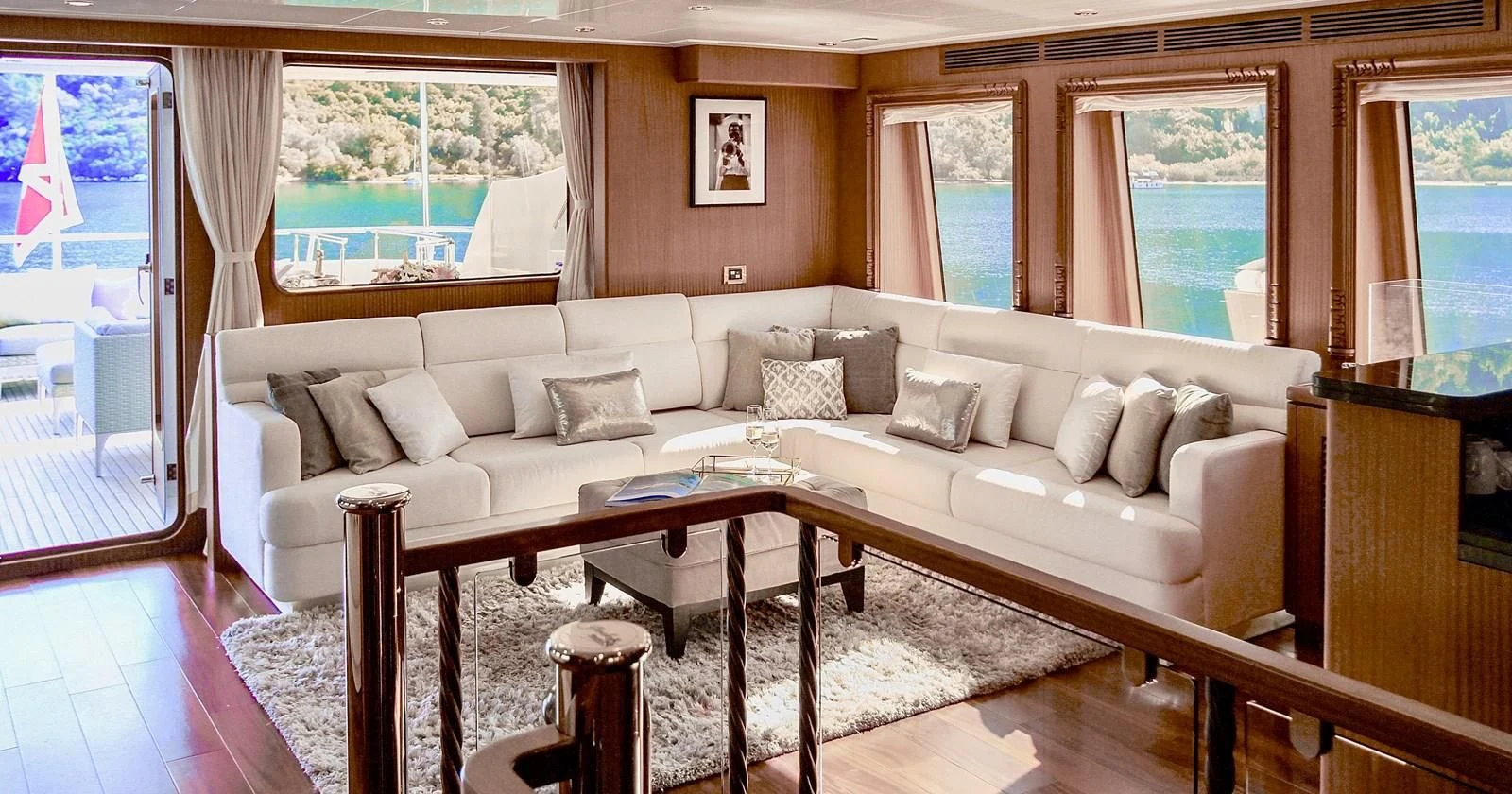 a living room with a couch and a table aboard BALTIC SEA Yacht for Sale