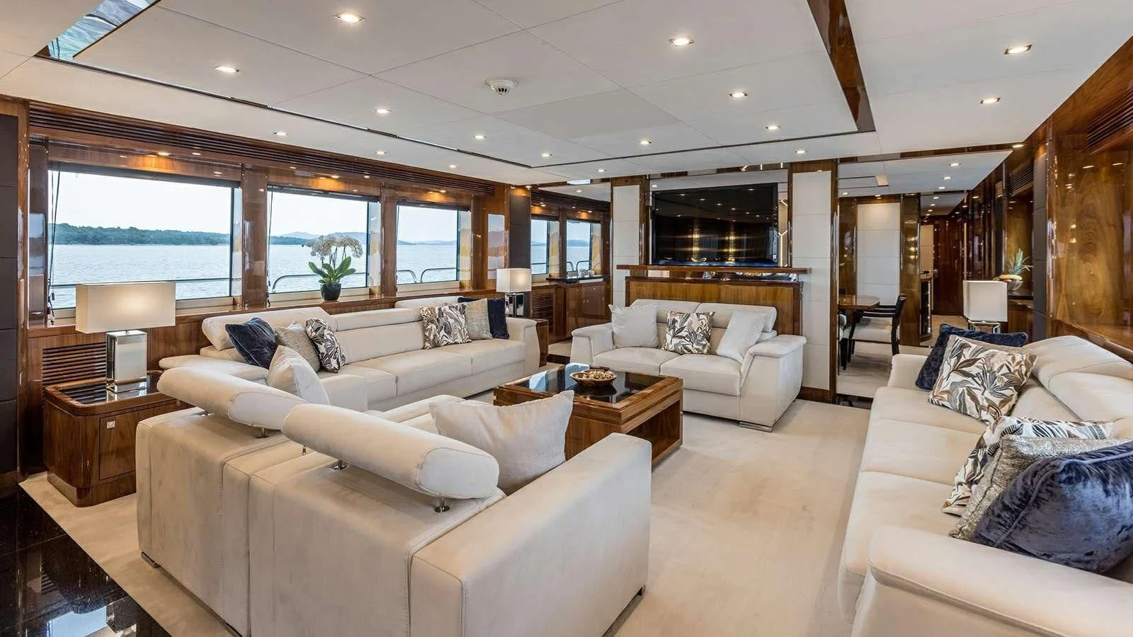 a living room with a couch and a table aboard KATARIINA I Yacht for Sale