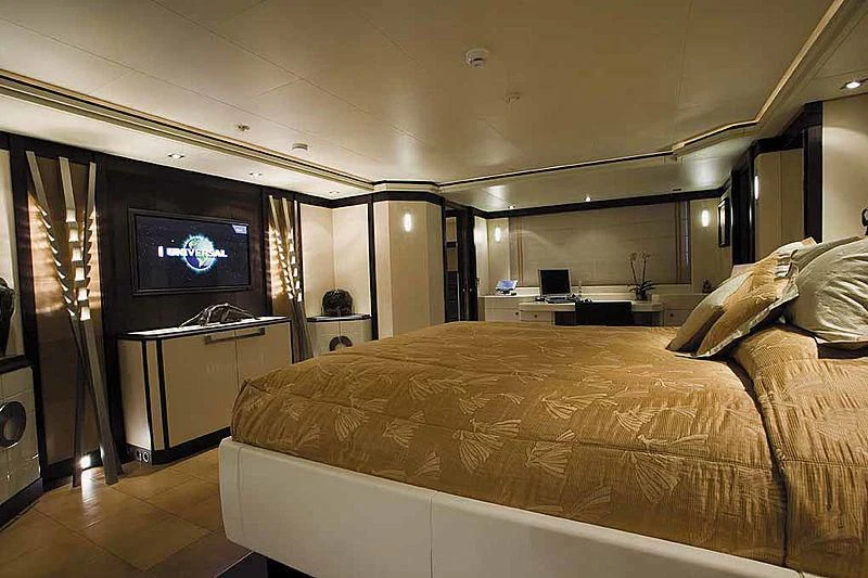 a bed room with a tv aboard ALALYA Yacht for Sale