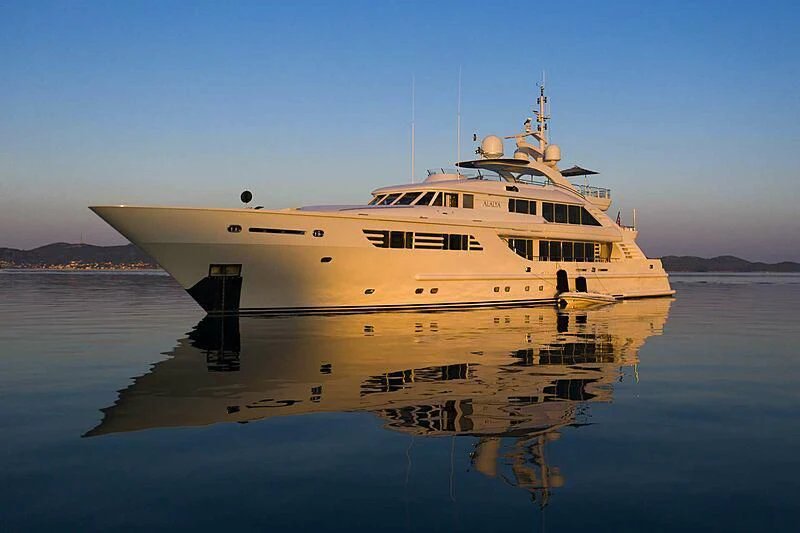 a large white ship in the water aboard ALALYA Yacht for Sale