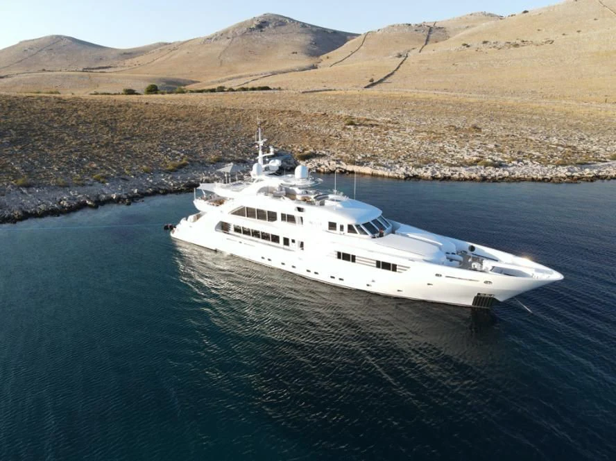 a white yacht in the water aboard ALALYA Yacht for Sale