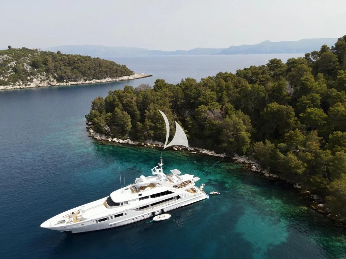 a boat sailing on the water aboard ALALYA Yacht for Sale