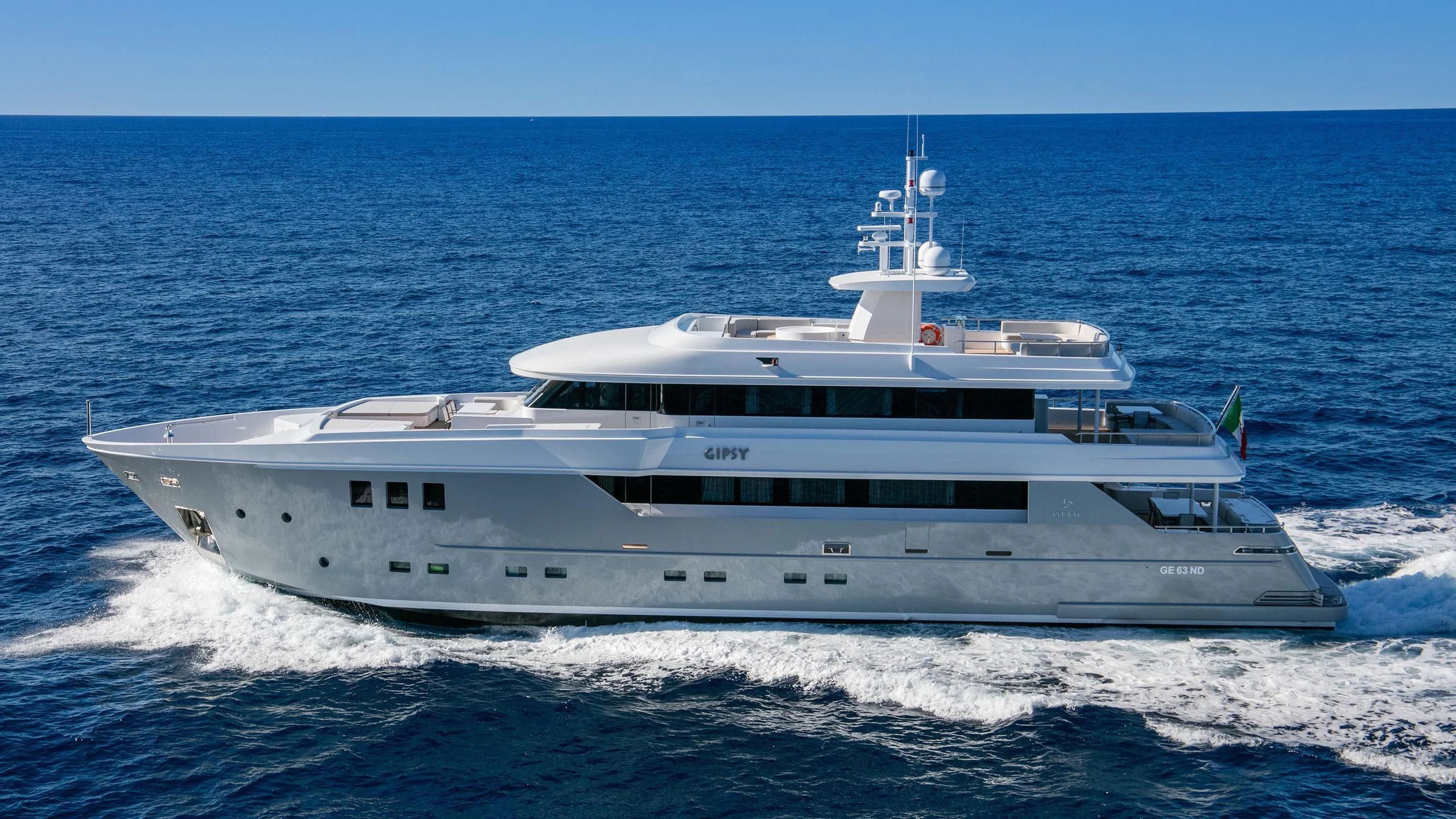 a white yacht on the water aboard ALALYA Yacht for Sale