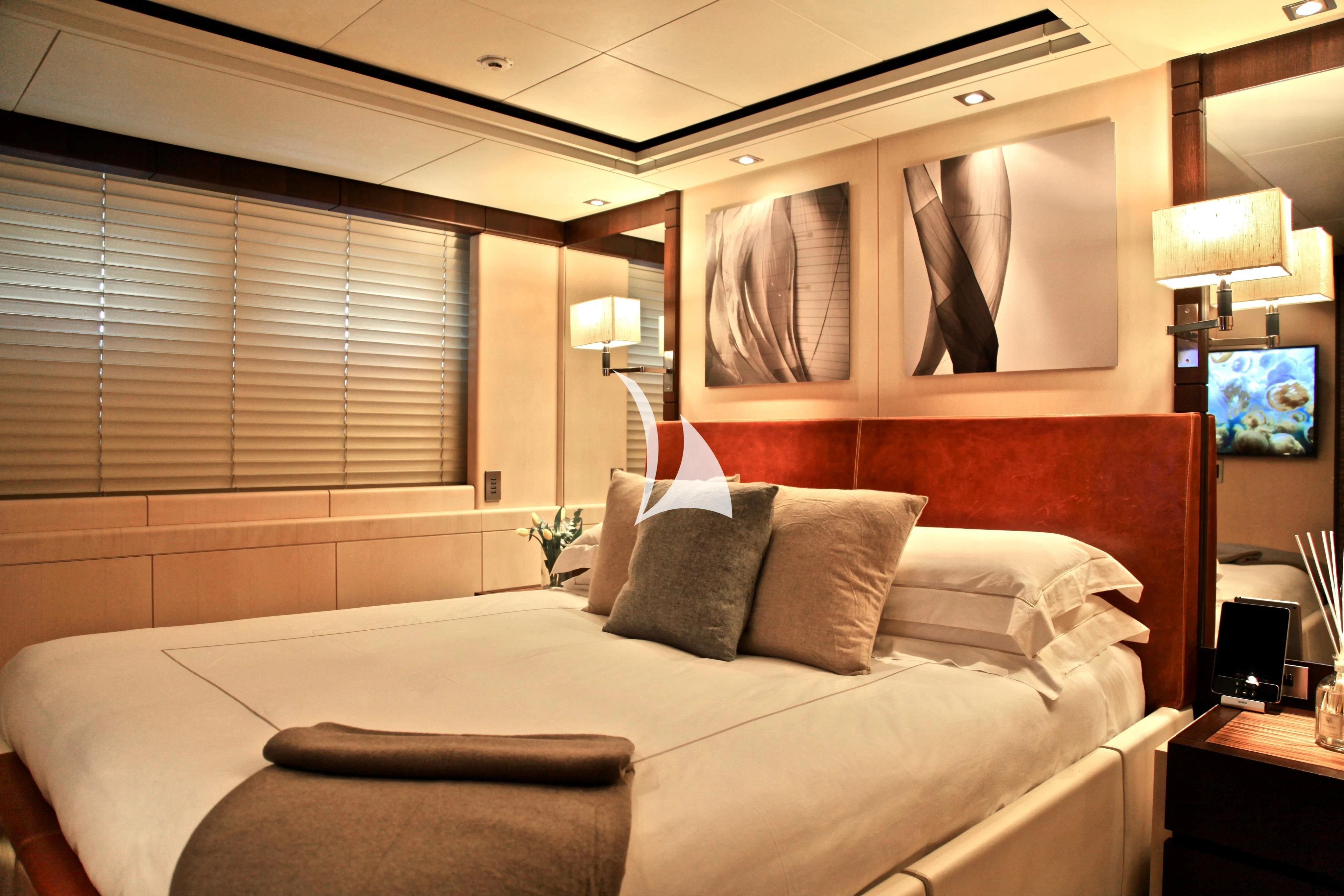 a bed with pillows aboard ALALYA Yacht for Sale