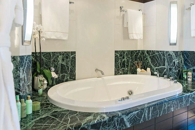 a bathroom with a large white sink aboard ALALYA Yacht for Sale