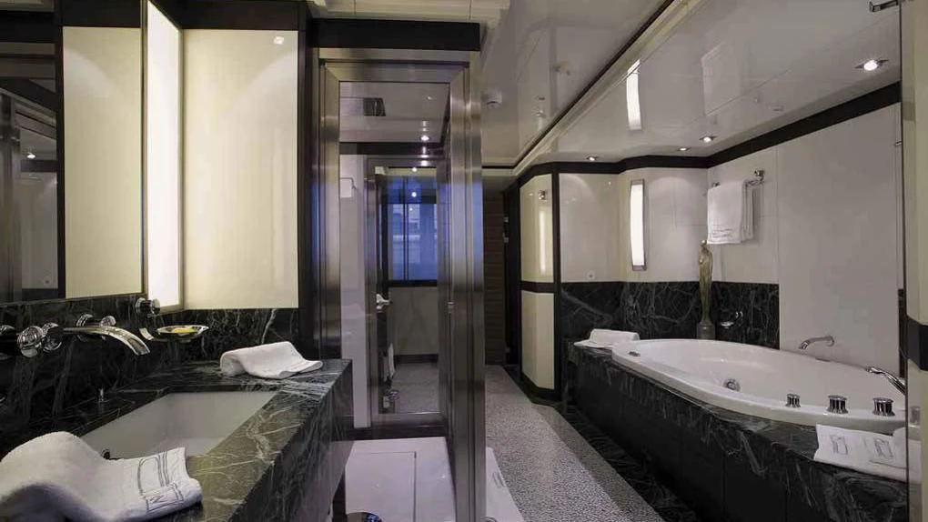 a bathroom with a large tub aboard ALALYA Yacht for Sale