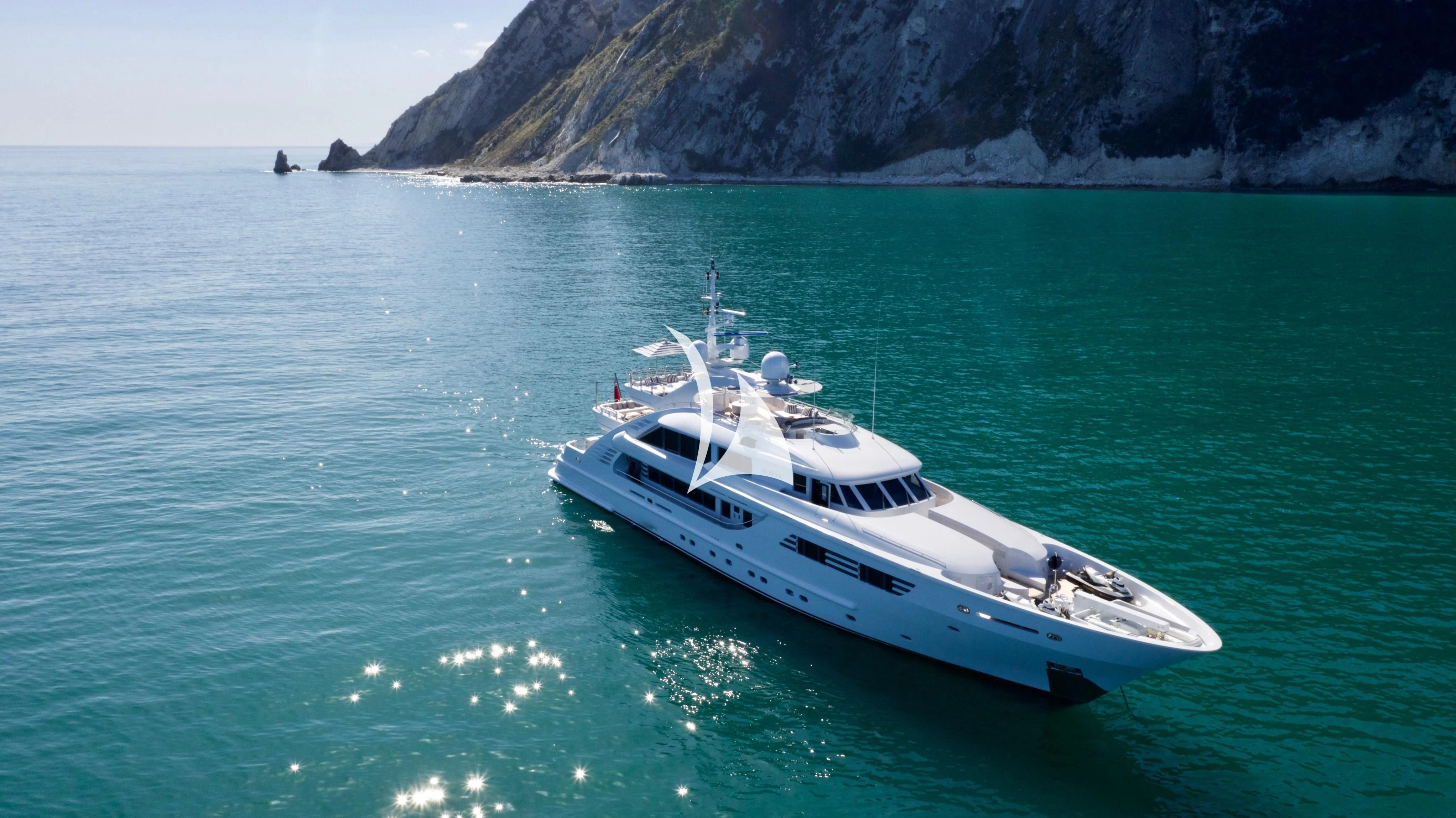 a white boat in the water aboard ALALYA Yacht for Sale