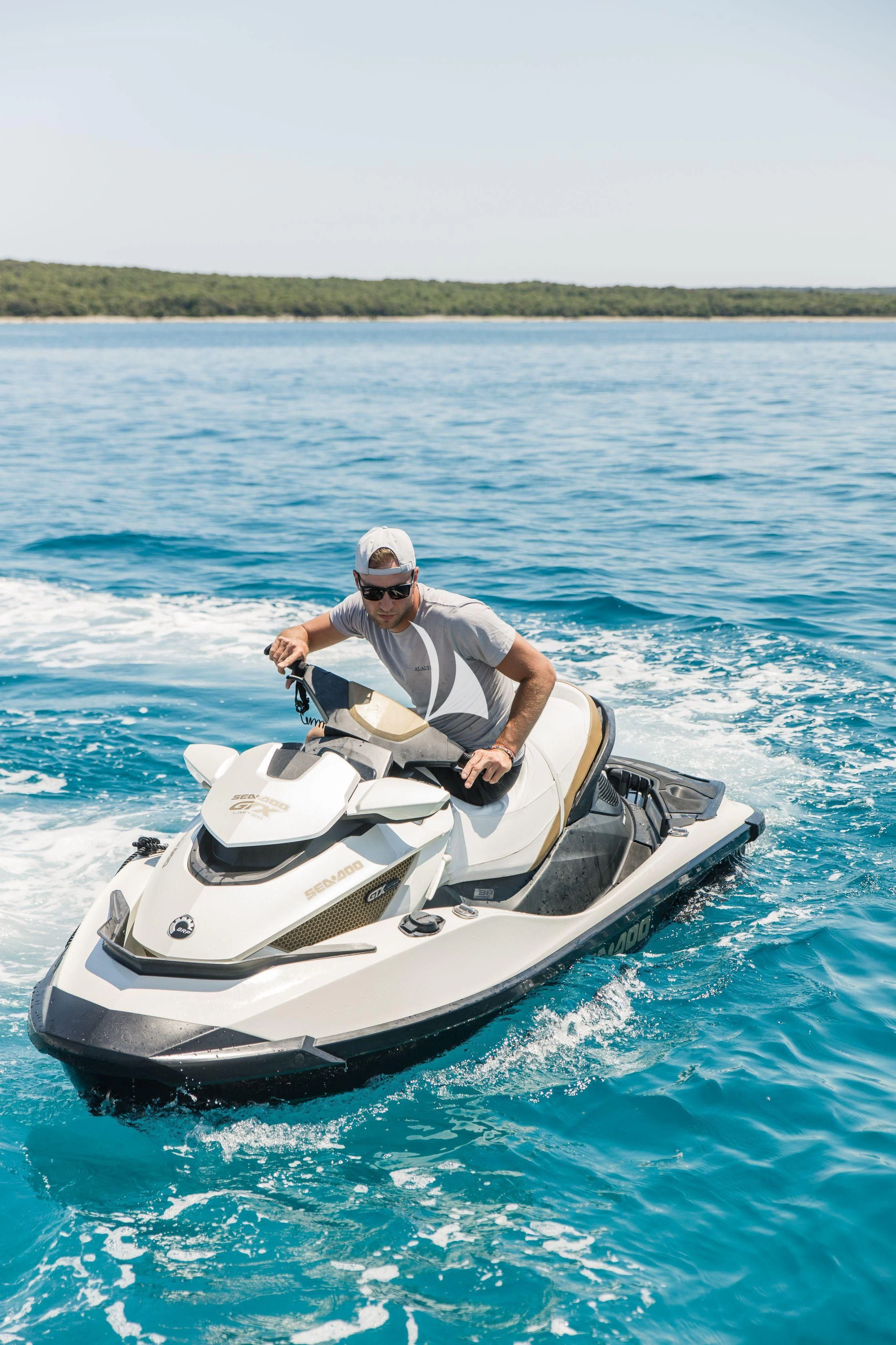 a man on a boat aboard ALALYA Yacht for Sale