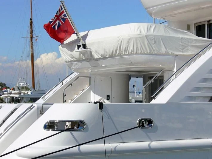 a boat with a flag on the front aboard ALALYA Yacht for Sale