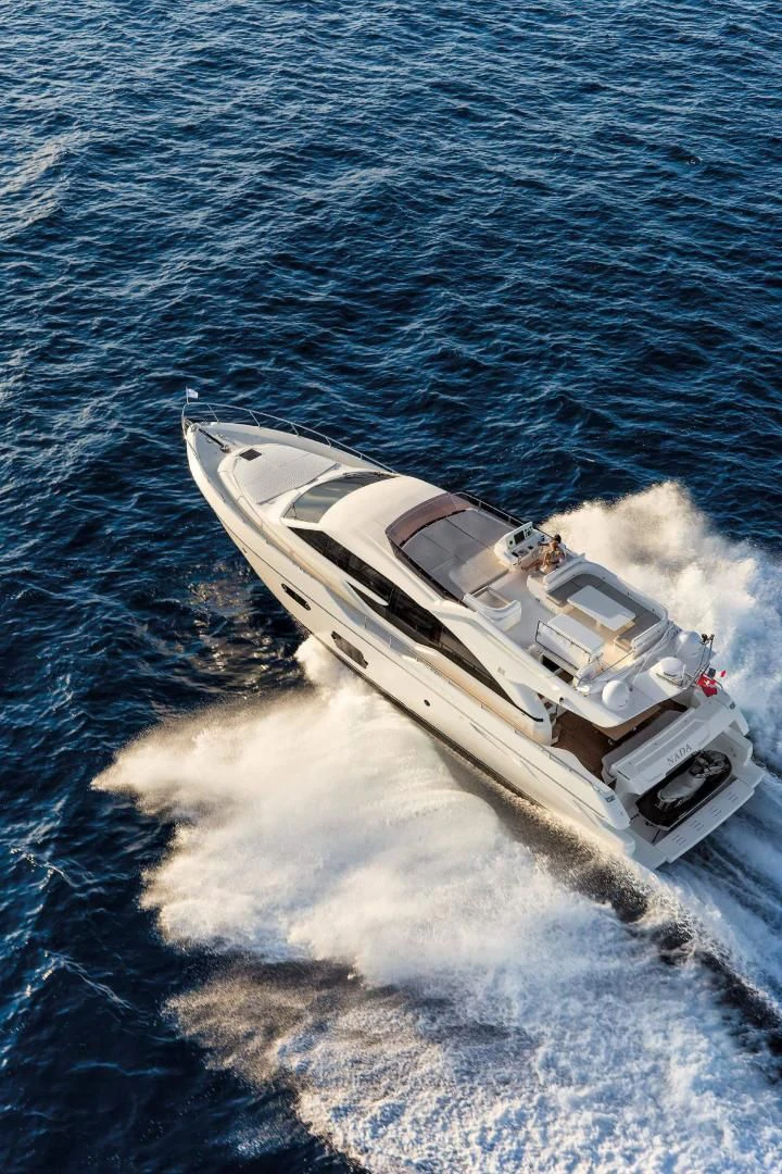 a car on the water aboard FERRETTI Yacht for Sale