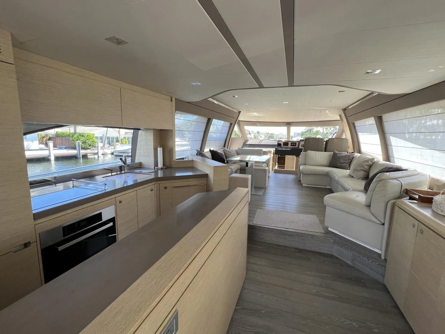 a kitchen with a large island aboard FERRETTI Yacht for Sale