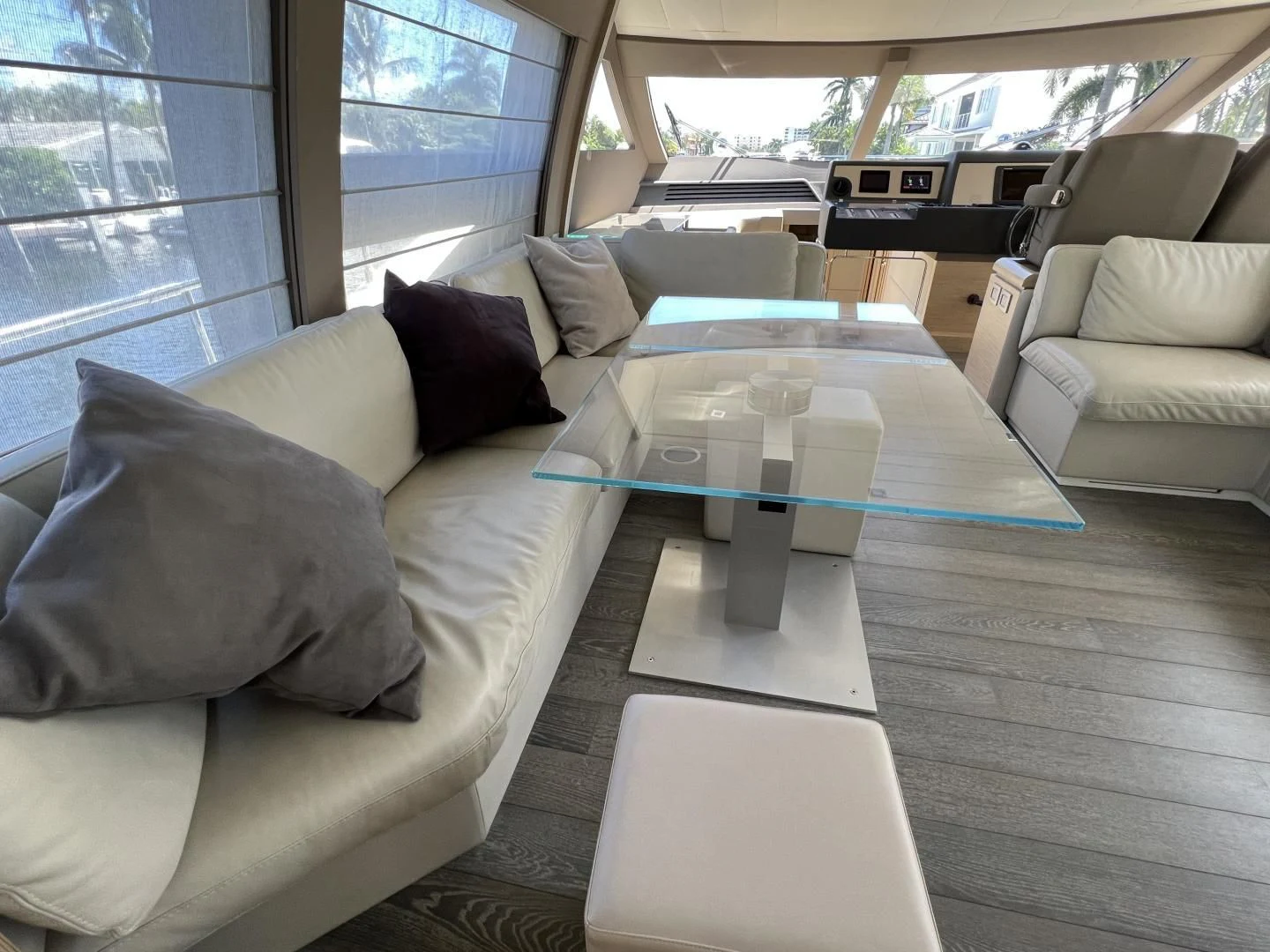 a living room with a couch and a table aboard FERRETTI Yacht for Sale