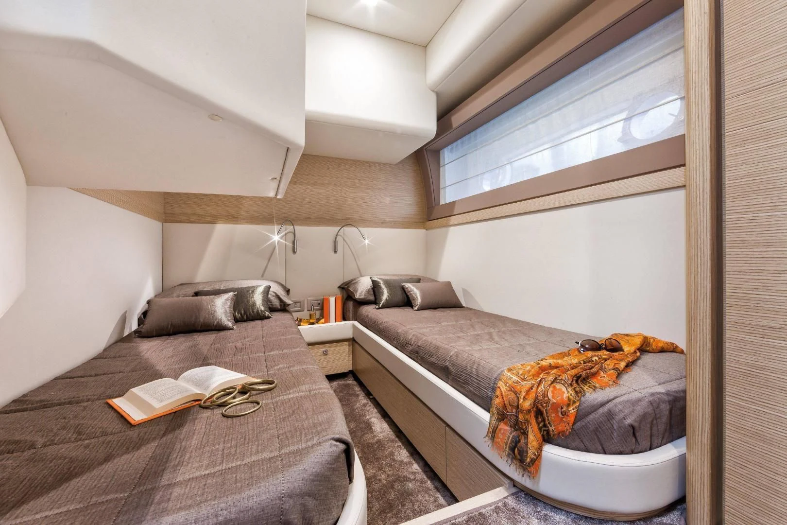 a bedroom with a bed and a couch aboard FERRETTI Yacht for Sale