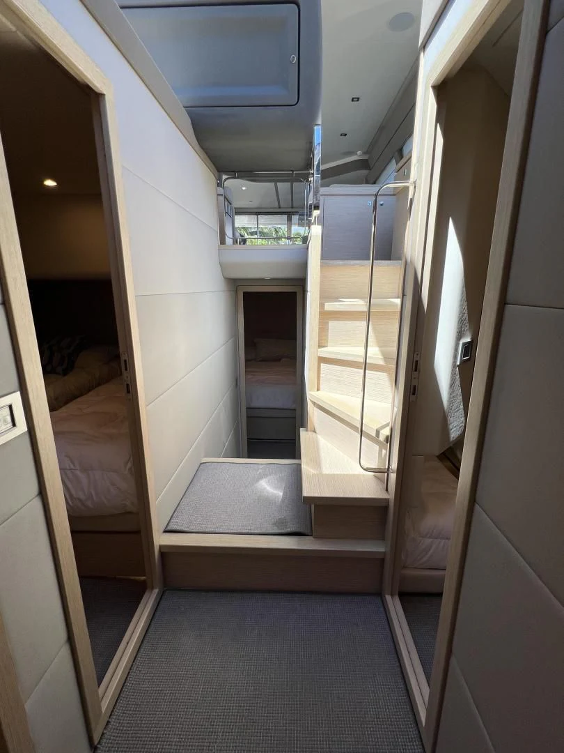 a hallway with a glass door aboard FERRETTI Yacht for Sale