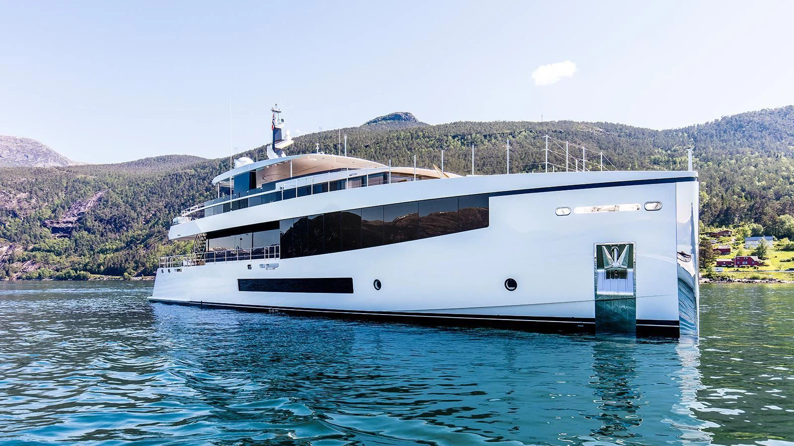 a white boat in the water aboard KAMINO Yacht for Sale