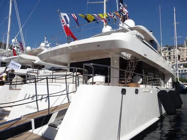 a boat docked at a pier aboard KAMINO Yacht for Sale