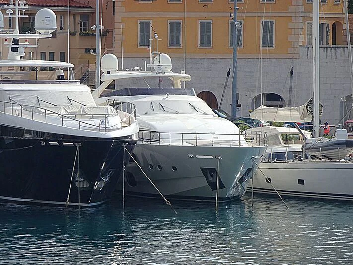 several boats are parked in the water aboard THINK BIG Yacht for Sale