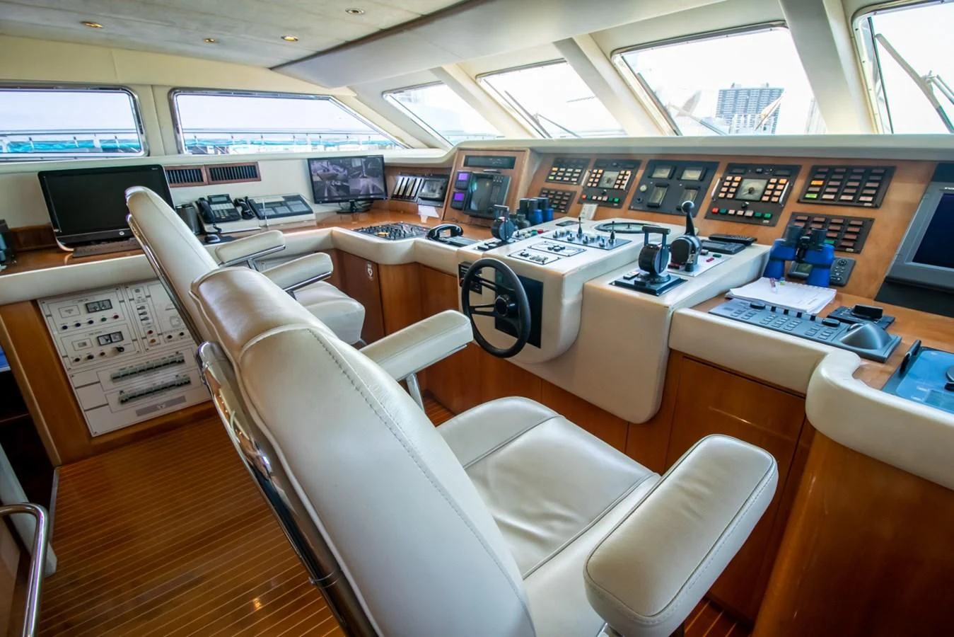 an airplane cockpit with many seats aboard SHALIMAR Yacht for Sale