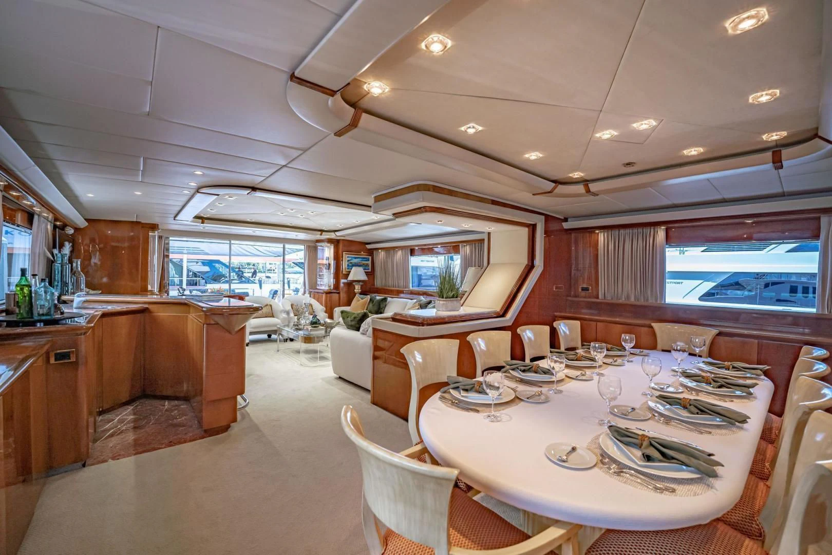 a large room with tables and chairs aboard SHALIMAR Yacht for Sale