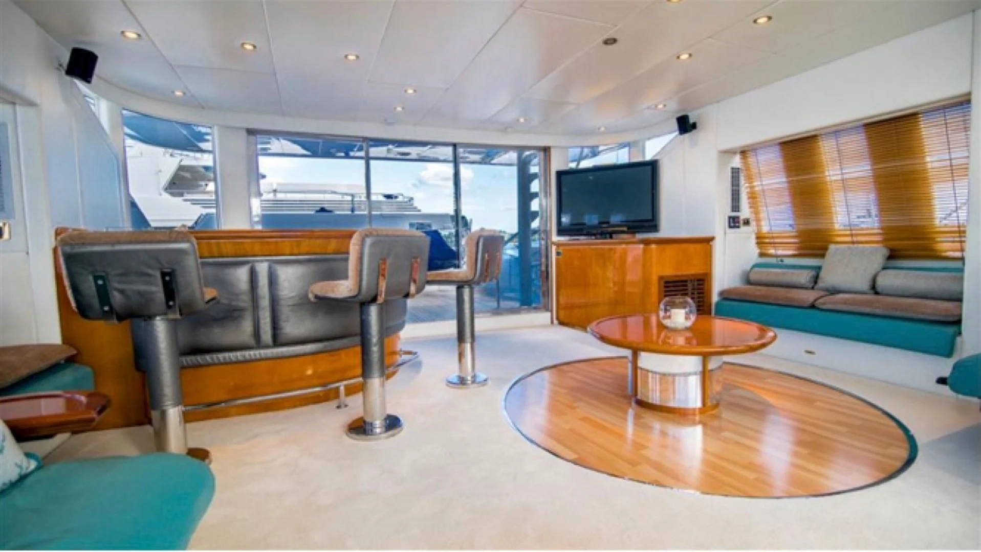 a living room with a couch and a table aboard SHALIMAR Yacht for Sale