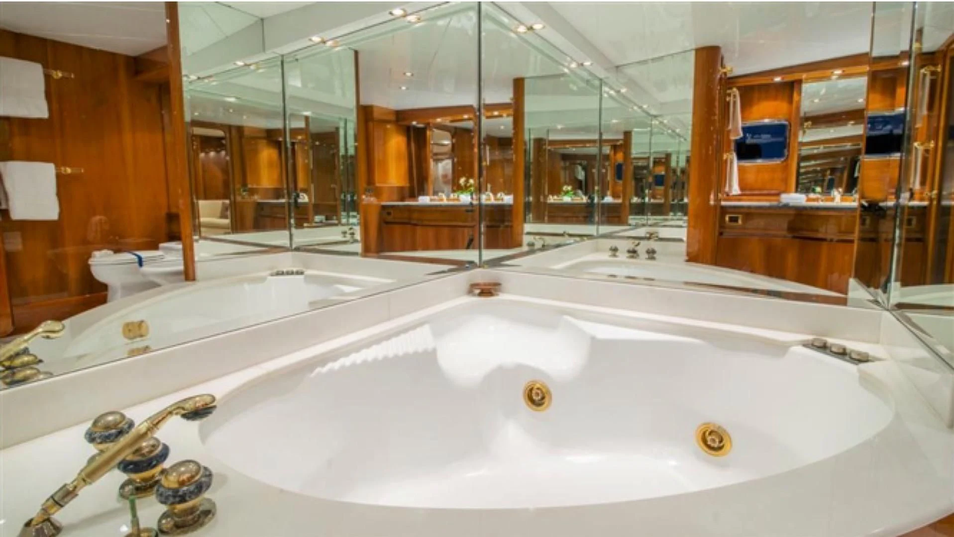 a large white bathtub in a bathroom aboard SHALIMAR Yacht for Sale