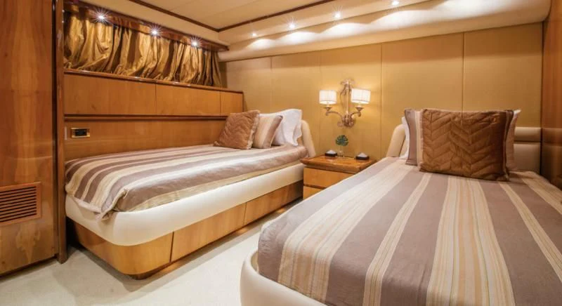 a couple of beds in a hotel room aboard SHALIMAR Yacht for Sale
