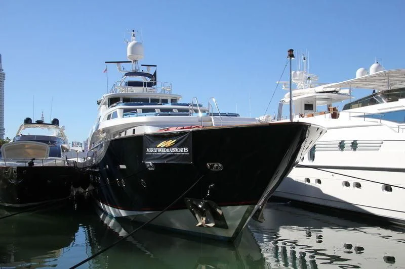 several boats docked at a pier aboard SHALIMAR Yacht for Sale