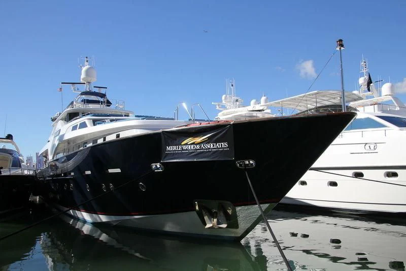 a large boat docked at a pier aboard SHALIMAR Yacht for Sale