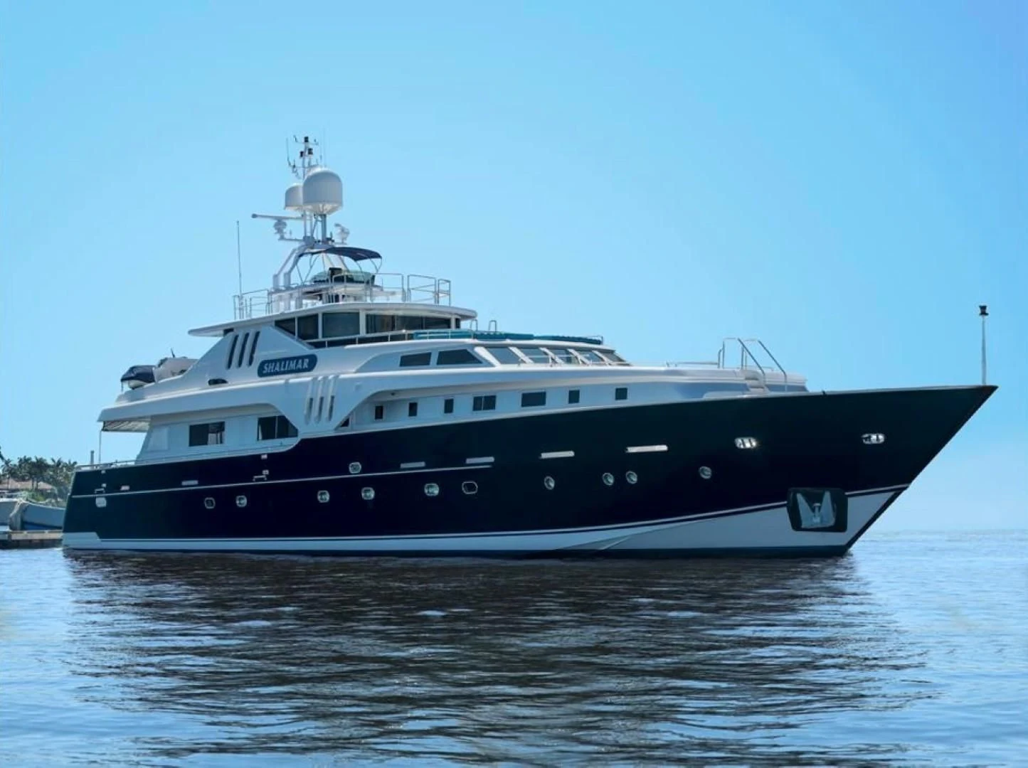 a large boat in the water aboard SHALIMAR Yacht for Sale